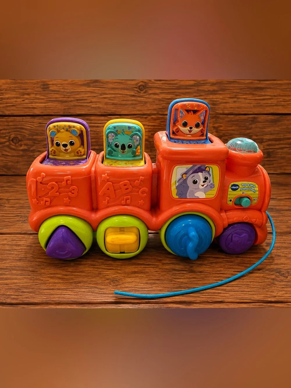 Interactive Orange Pull-Along Learning Train with Colorful Pop-Up Animals